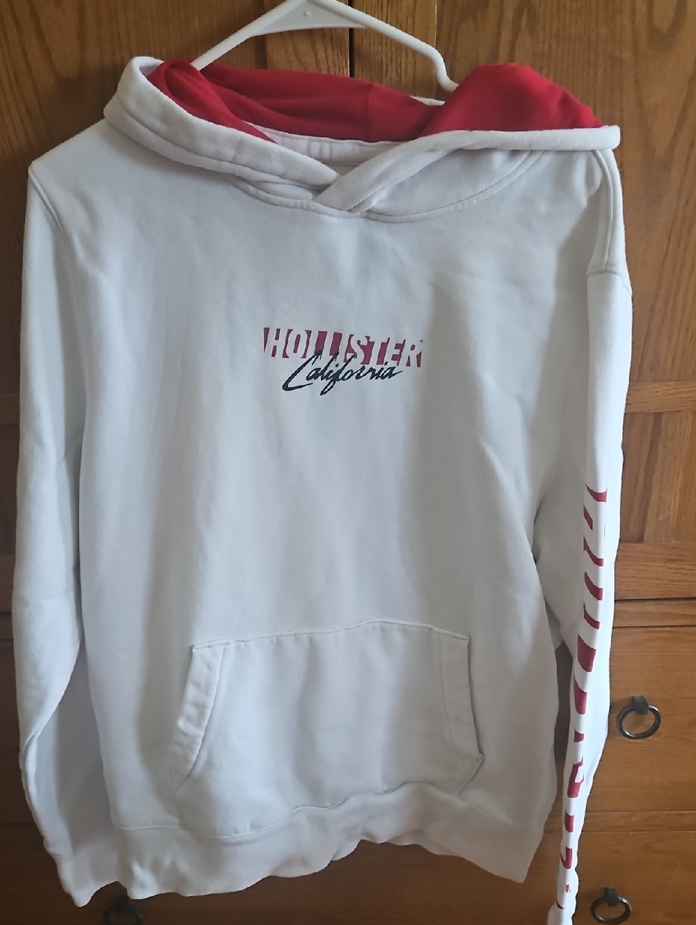 Hollister White Hoodie with Red Hood and Red Logo.